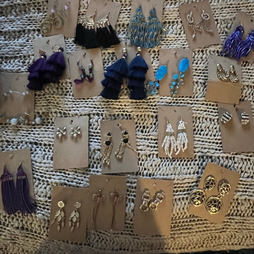 20 pair of pierced fashion earrings.